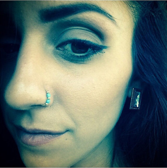 Turquoise stone. nose ring hoops. 